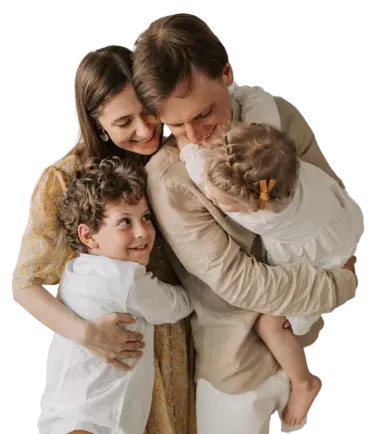 a man and woman hugging children